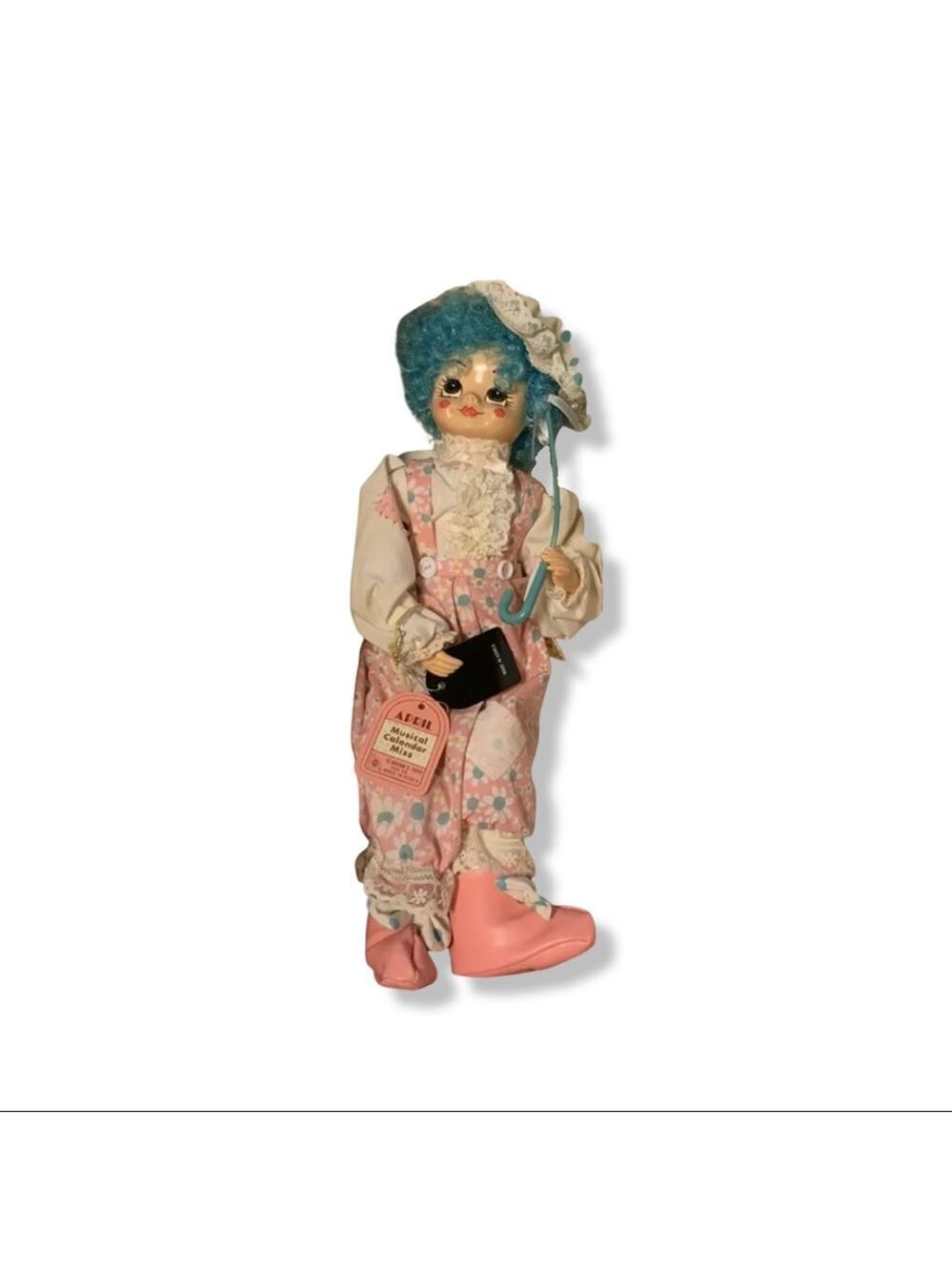 Authentic 1986 Brinn’s Musical Calendar Miss Doll, April Birthday